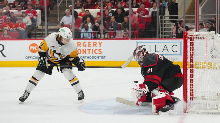 Mar 10, 2026; Raleigh, North Carolina, USA;  Carolina Hurricanes goaltender Frederik Andersen (31) stops the tips shot by Pittsburgh Penguins right wing Ville Koivunen (41) during the second period at Lenovo Center. Mandatory Credit: James Guillory-Imagn Images