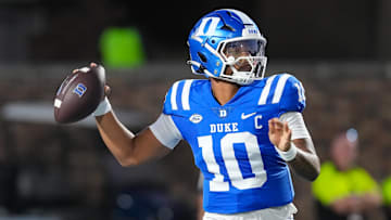 Aug 28, 2025; Durham, North Carolina, USA;  Duke Blue Devils quarterback Darian Mensah (10) goes to throw the ball against the Elon Phoenix during the first half at Wallace Wade Stadium. Mandatory Credit: James Guillory-Imagn Images