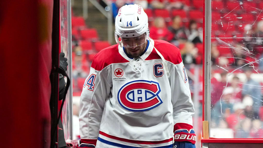 Mar 29, 2026; Raleigh, North Carolina, USA;  Montreal Canadiens center Nick Suzuki (14) comes off the ice after the warm-ups before the game against the Carolina Hurricanes at Lenovo Center. Mandatory Credit: James Guillory-Imagn Images