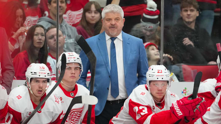 Feb 28, 2026; Raleigh, North Carolina, USA;  Detroit Red Wings head coach Todd McLellan looks on against the Carolina Hurricanes during the third period at Lenovo Center. Mandatory Credit: James Guillory-Imagn Images