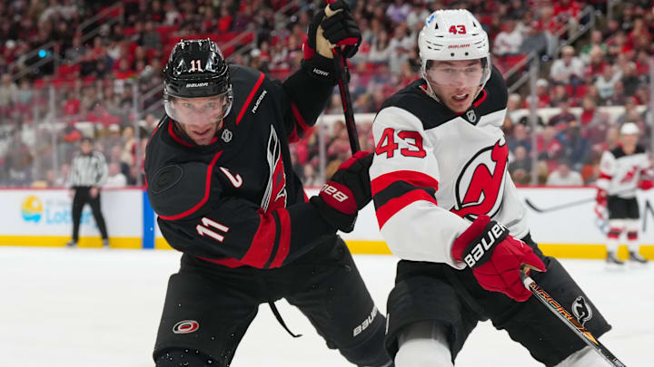 Carolina Hurricanes center Jordan Staal (11) and New Jersey Devils defenseman Luke Hughes (43): James Guillory-Imagn Images