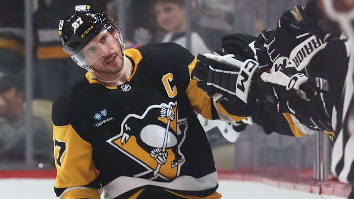 Mar 21, 2025; Pittsburgh, Pennsylvania, USA; Pittsburgh Penguins center Sidney Crosby (87) celebrates his goal with the Penguins bench against the Columbus Blue Jackets during the second period at PPG Paints Arena. Mandatory Credit: Charles LeClaire-Imagn Images Mar 21, 2025; Pittsburgh, Pennsylvania, USA; Pittsburgh Penguins center Sidney Crosby (87) celebrates his goal with the Penguins bench against the Columbus Blue Jackets during the second period at PPG Paints Arena. Mandatory Credit: Charles LeClaire-Imagn Images