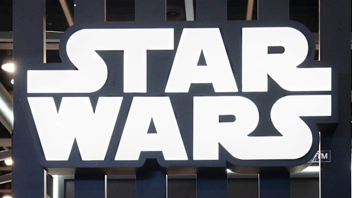 Visitors are seen at Disney's Star Wars booth during the Ani...