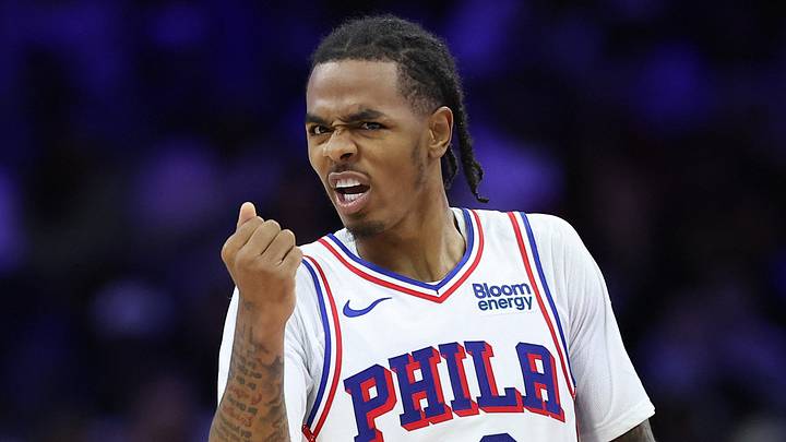 Philadelphia, Pennsylvania, USA; Philadelphia 76ers guard Labaron Philon Jr. (00) reacts during the fourth quarter against the New York Knicks at Xfinity Mobile Arena on October 5, 2026.