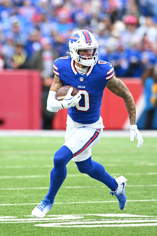 Buffalo Bills wide receiver Keon Coleman carries the ball after making a catch in the second quarter
