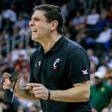 Mar 14, 2024; Kansas City, MO, USA; Cincinnati Bearcats coach Wes Miller reacts to a play during the second half against the Baylor Bears at T-Mobile Center. Mandatory Credit: William Purnell-USA TODAY Sports