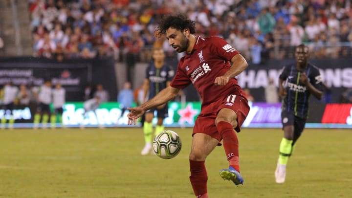 Jul 25, 2018; East Rutherford, NJ, USA; Liverpool forward Mohamed Salah (11) plays the ball against Manchester City during the second half of an International Champions Cup soccer match at MetLife Stadium. Mandatory Credit: Brad Penner-USA TODAY Sports