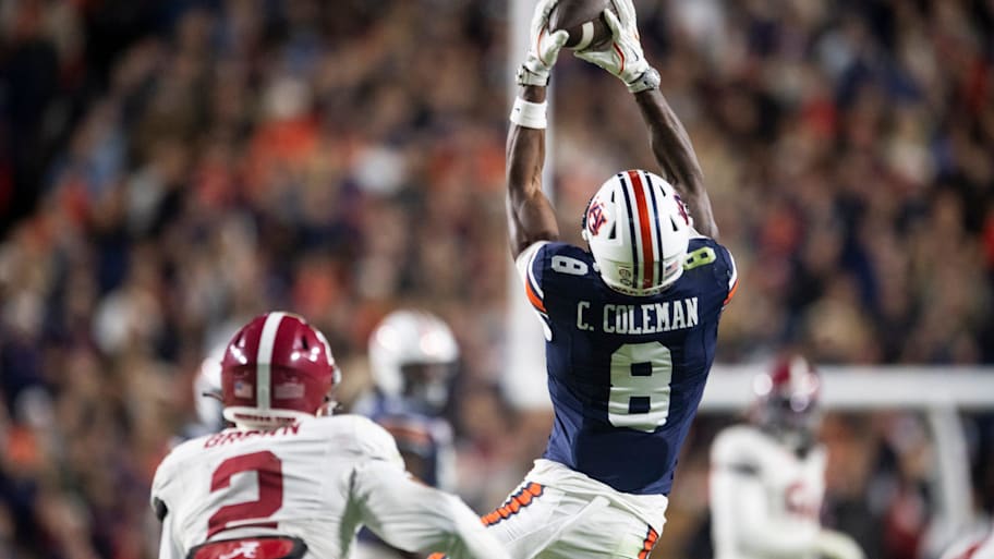 Auburn wide receiver Cam Coleman catches a pass.