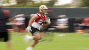 Jul 24, 2025; Santa Clara, CA, USA; San Francisco 49ers running back Christian McCaffrey (23) runs a play from scrimmage during the second day of training camp. Mandatory Credit: D. Ross Cameron-Imagn Images