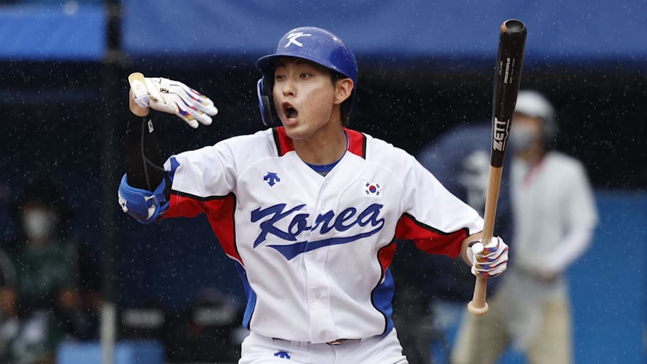 Team South Korea outfielder Jung Hoo Lee (51) gestures after a wild pitch in 2020 Olympics