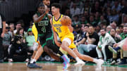 May 23, 2024; Boston, Massachusetts, USA; Indiana Pacers guard Ben Sheppard (26) dribbles the ball against Boston Celtics guard Jrue Holiday (4) in the first half during game two of the eastern conference finals for the 2024 NBA playoffs at TD Garden. Mandatory Credit: David Butler II-USA TODAY Sports