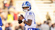 Nov 8, 2025; East Hartford, Connecticut, USA; Duke Blue Devils quarterback Darian Mensah (10) warms up before the start of the game against the UConn Huskies at Pratt & Whitney Stadium at Rentschler Field. Mandatory Credit: David Butler II-Imagn Images
