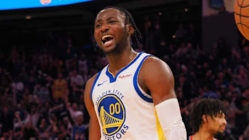 Dec 6, 2023; San Francisco, California, USA; Golden State Warriors forward Jonathan Kuminga (00) reacts after a dunk against the Portland Trail Blazers during the fourth quarter at Chase Center. Mandatory Credit: Kelley L Cox-Imagn Images