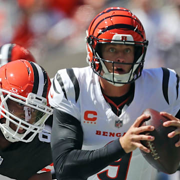Cleveland Browns defensive end Myles Garrett (95) chases down Cincinnati Bengals quarterback Joe Burrow (9) during the first half of an NFL football game at Huntington Bank Field, Sept. 7, 2025, in Cleveland, Ohio.