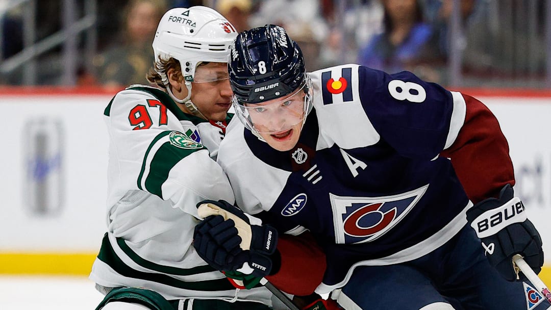 Feb 26, 2026; Denver, Colorado, USA; Colorado Avalanche defenseman Cale Makar (8) and Minnesota Wild left wing Kirill Kaprizov (97) battle for the puck in the third period at Ball Arena. Mandatory Credit: Isaiah J. Downing-Imagn Images