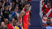 Nov 20, 2023; New Orleans, Louisiana, USA;  New Orleans Pelicans forward Zion Williamson (1) reacts to dunking the ball against the Sacramento Kings during the second half at the Smoothie King Center. 