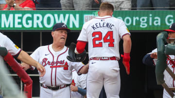 Jun 18, 2024; Atlanta, Georgia, USA; Atlanta Braves manager Brian Snitker (43) talks to left fielder Jarred Kelenic (24) after scoring a run against the Detroit Tigers in the first inning at Truist Park. Mandatory Credit: Brett Davis-USA TODAY Sports