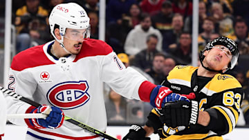 Oct 10, 2024; Boston, Massachusetts, USA;  Montreal Canadiens defenseman Arber Xhekaj (72) punches Boston Bruins left wing Brad Marchand (63) during the third period at TD Garden. Mandatory Credit: Bob DeChiara-Imagn Images