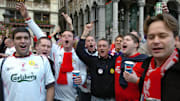 Liverpool supporters chant as they gathe