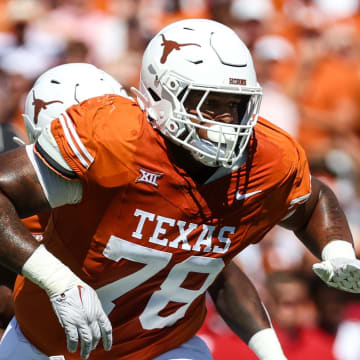 Oct 7, 2023; Dallas, Texas, USA;  Texas Longhorns offensive lineman Kelvin Banks Jr. (78) blocks during the game against the Oklahoma Sooners at the Cotton Bowl. Mandatory Credit: Kevin Jairaj-USA TODAY Sports