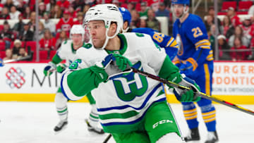 Feb 27, 2025; Raleigh, North Carolina, USA;  Carolina Hurricanes right wing Mikko Rantanen (96) skates against the Buffalo Sabres during the first period at Lenovo Center. Mandatory Credit: James Guillory-Imagn Images
