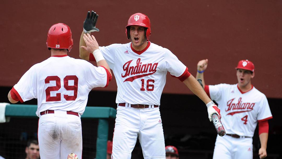 Jun 9, 2013; Tallahassee, FL, USA; Indiana Hoosiers second baseman Chad Clark (29) celebrates with third baseman Dustin DeMuth (16) celebrate after a play against the Florida State Seminoles during the Tallahassee super regional of the 2013 NCAA baseball tournament at Dick Howser Stadium. Mandatory Credit: Melina Vastola-USA TODAY Sports Jun 9, 2013; Tallahassee, FL, USA; Indiana Hoosiers second baseman Chad Clark (29) celebrates with third baseman Dustin DeMuth (16) celebrate after a play against the Florida State Seminoles during the Tallahassee super regional of the 2013 NCAA baseball tournament at Dick Howser Stadium. Mandatory Credit: Melina Vastola-USA TODAY Sports