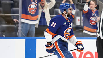 Nov 23, 2025; Elmont, New York, USA;  New York Islanders center Kyle Palmieri (21) celebrates after scoring the game winning shootout goal in overtime against the Seattle Kraken at UBS Arena. Mandatory Credit: Wendell Cruz-Imagn Images