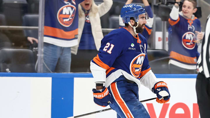 Nov 23, 2025; Elmont, New York, USA;  New York Islanders center Kyle Palmieri (21) celebrates after scoring the game winning shootout goal in overtime against the Seattle Kraken at UBS Arena. Mandatory Credit: Wendell Cruz-Imagn Images