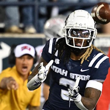 Oct 11, 2024; Logan, Utah, USA;  Utah State Aggies running back Rahsul Faison (3) catches a pass in the second half against the UNLV Rebels at Merlin Olsen Field at Maverik Stadium. Mandatory Credit: Jamie Sabau-Imagn Images