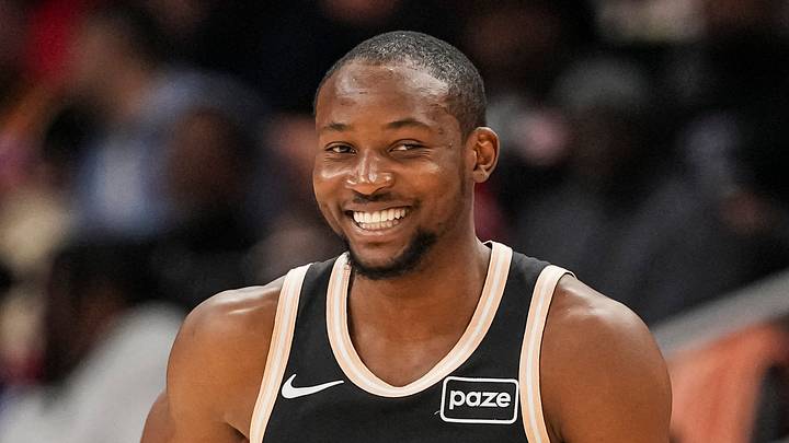 Feb 26, 2026; Atlanta, Georgia, USA; Atlanta Hawks forward Jonathan Kuminga (0) reacts after making a three point shot against the Washington Wizards during the first half at State Farm Arena. Mandatory Credit: Dale Zanine-Imagn Images