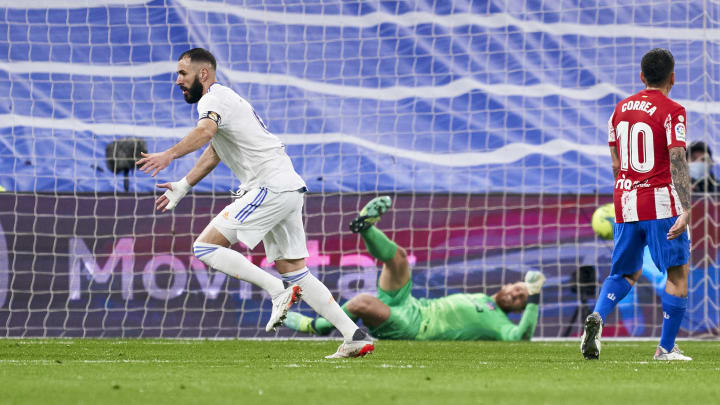 Karim Benzema peels away to celebrate Real Madrid's opening goal in a triumphant capital derby