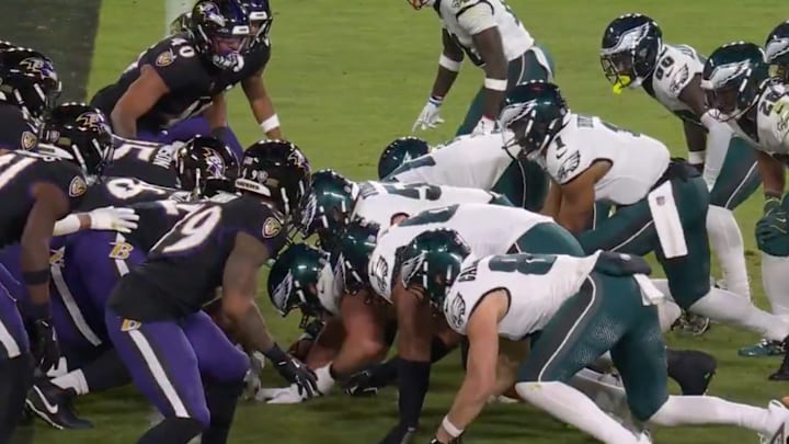 Several members of the Philadelphia Eagles offensive line get a head start on a Tush Push play. Several members of the Philadelphia Eagles offensive line get a head start on a Tush Push play.
