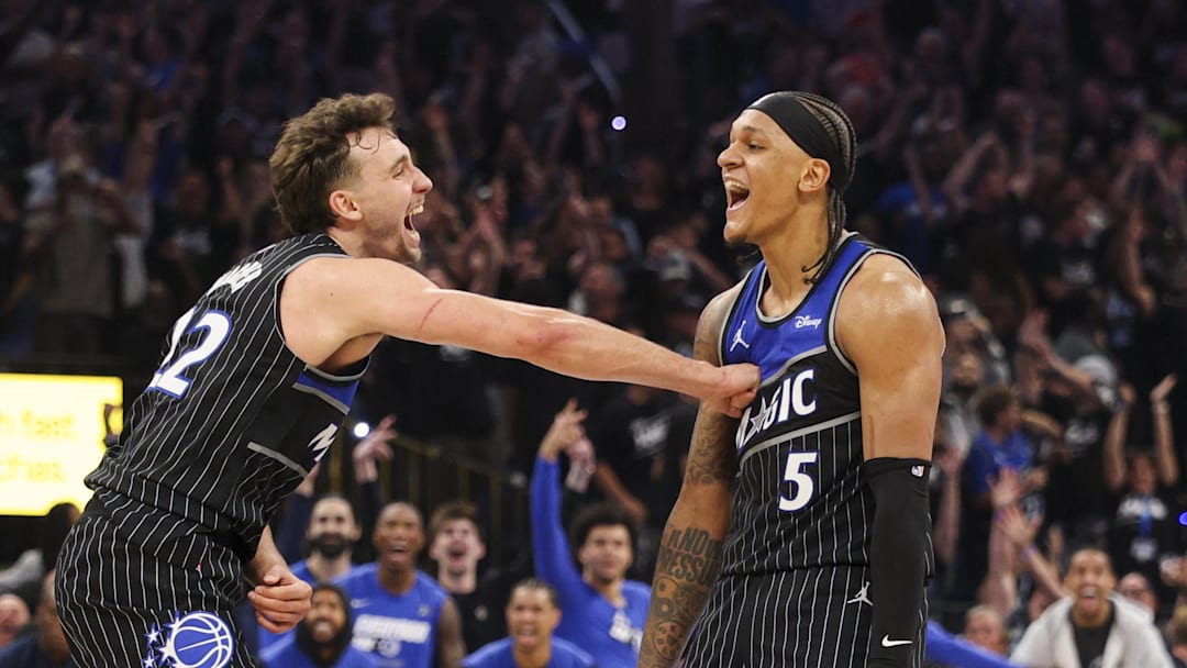 Apr 25, 2026; Orlando, Florida, USA; Orlando Magic forward Franz Wagner (22) reacts to a shot by forward Paolo Banchero (5) against the Detroit Pistons in the fourth quarter during game three of the first round of the 2026 NBA Playoffs at Kia Center. Mandatory Credit: Nathan Ray Seebeck-Imagn Images