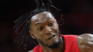 Toronto Raptors guard Immanuel Quickley drives against Philadelphia 76ers guard Quentin Grimes.