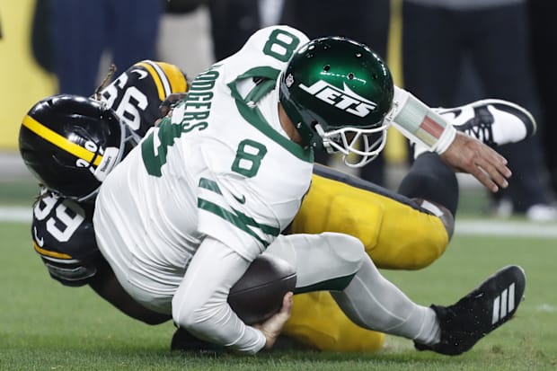 Pittsburgh Steelers defensive tackle Larry Ogunjobi sacks New York Jets quarterback Aaron Rodgers.