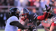 Texas Tech's Jacob Rodriguez rushes Colorado quarterback Shedeur Sanders.