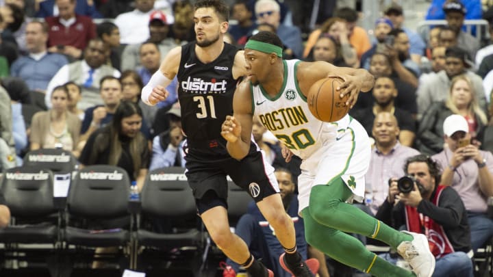 Apr 9, 2019; Washington, DC, USA;  Boston Celtics forward Guerschon Yabusele (30) makes a move to the basket as Washington Wizards guard Tomas Satoransky (31) defends during the second half at Capital One Arena. Mandatory Credit: Tommy Gilligan-USA TODAY Sports