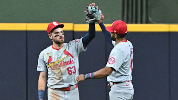 Sep 3, 2024; Milwaukee, Wisconsin, USA;  St. Louis Cardinals outfielder Michael Siani (63) and St. Louis Cardinals outfielder Victor Scott II (11) celebrate a 5-4 win over the Milwaukee Brewers in 12 innings at American Family Field. Mandatory Credit: Michael McLoone-Imagn Images