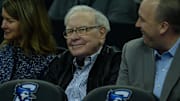 Omaha businessman Warren Buffett watches the game between the Creighton Bluejays and the Villanova Wildcats.