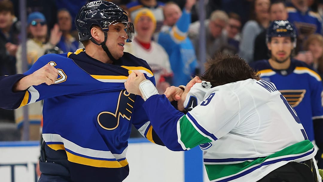 Blues captain C Brayden Schenn taking on J.T. Miller in a brawl