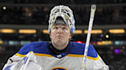 Mar 22, 2025; Saint Paul, Minnesota, USA;  Buffalo Sabres goalie Ukko-Pekka Luukkonen (1) takes a breather against the Minnesota Wild during the third period at Xcel Energy Center. Mandatory Credit: Nick Wosika-Imagn Images