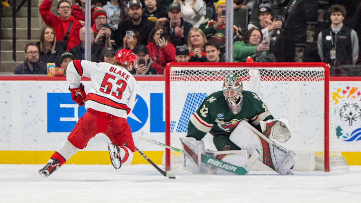 Feb 6, 2025; Saint Paul, Minnesota, USA; Minnesota Wild goaltender Filip Gustavsson (32) stops Carolina Hurricanes right wing Jackson Blake (53) on a penalty shot in the second period at Xcel Energy Center. Mandatory Credit: Matt Blewett-Imagn Images
