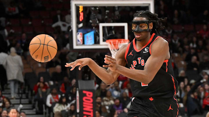 Apr 4, 2025; Toronto, Ontario, CAN; Toronto Raptors forward Jonathan Mogbo (2) passes the ball against the Detroit Pistons in the second half at Scotiabank Arena. Mandatory Credit: Dan Hamilton-Imagn Images Apr 4, 2025; Toronto, Ontario, CAN; Toronto Raptors forward Jonathan Mogbo (2) passes the ball against the Detroit Pistons in the second half at Scotiabank Arena. Mandatory Credit: Dan Hamilton-Imagn Images