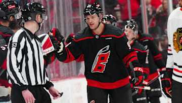 Jan 30, 2025; Raleigh, North Carolina, USA; Carolina Hurricanes right wing Mikko Rantanen (96) celebrates his goal against the Chicago Blackhawks during the second period at Lenovo Center. Mandatory Credit: James Guillory-Imagn Images