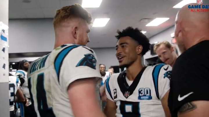 Andy Dalton and Bryce Young celebrate the Panthers’ first win.