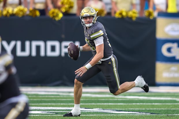 Haynes King scrambles against Temple.
