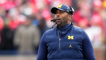 Nov 25, 2023; Ann Arbor, Michigan, USA; Michigan Wolverines interim head coach Sherrone Moore talks on the sideline during the NCAA football game against the Ohio State Buckeyes at Michigan Stadium. Ohio State lost 30-24.