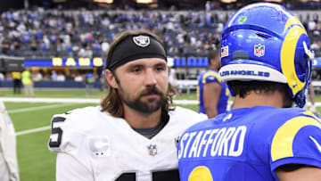 Oct 20, 2024; Inglewood, California, USA; Las Vegas Raiders quarterback Gardner Minshew (15) greets Los Angeles Rams quarterback Matthew Stafford (9) after the second half at SoFi Stadium. Mandatory Credit: Alex Gallardo-Imagn Images