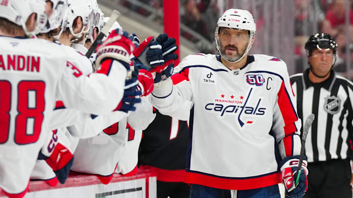 May 12, 2025; Raleigh, North Carolina, USA; Washington Capitals left wing Alex Ovechkin (8) scores a goal against the Carolina Hurricanes during the third period in game four of the second round of the 2025 Stanley Cup Playoffs at Lenovo Center. Mandatory Credit: James Guillory-Imagn Images
