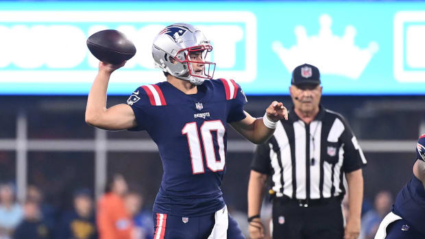 New England Patriots quarterback Drake Maye (10) throws a pass against the Philadelphia Eagles during the first half.